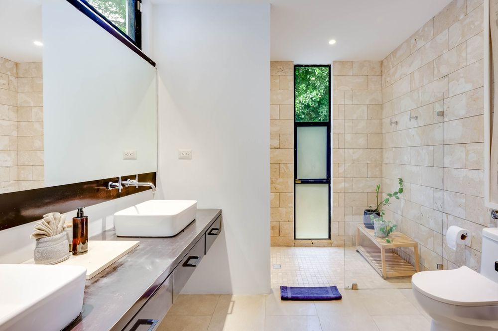 Stone shower and double vanity