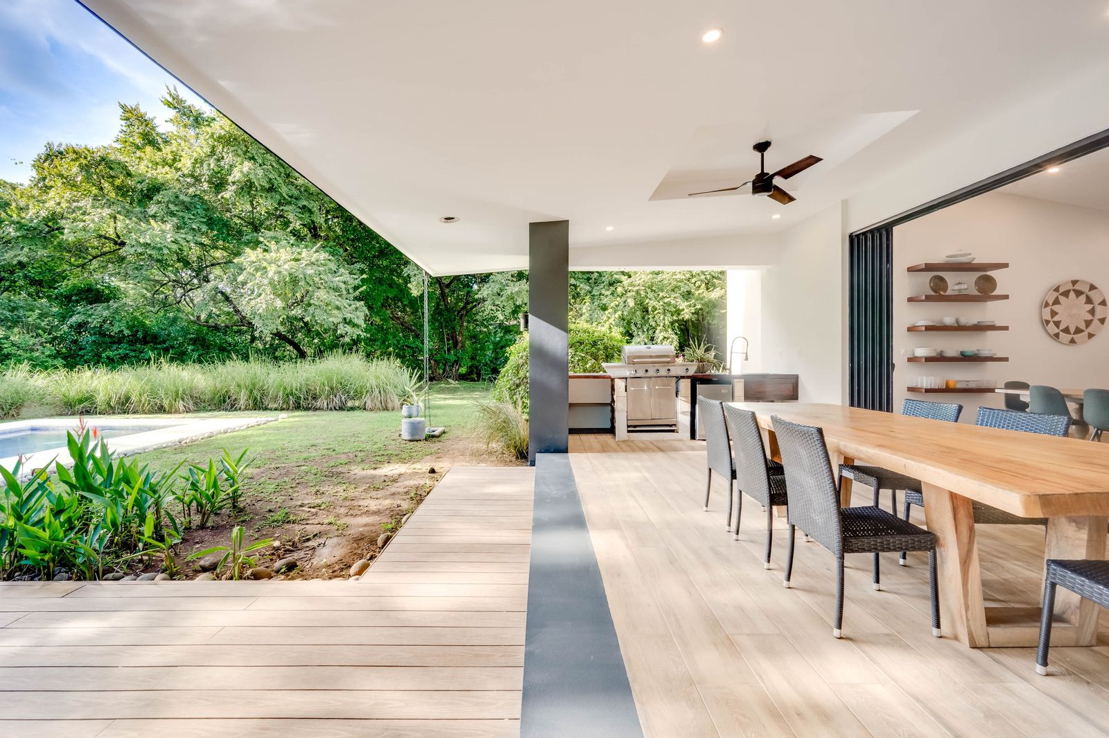 Outdoor dining terrace at Casa Poiema