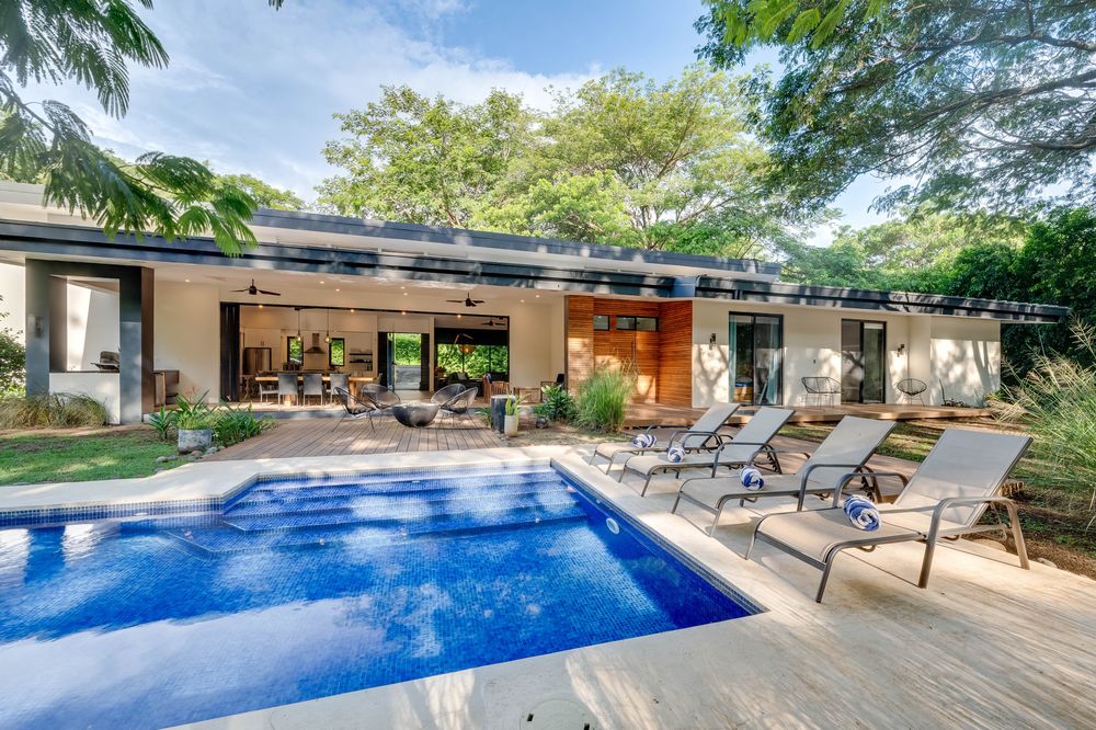 Pool, deck and the open great room at Casa Poiema
