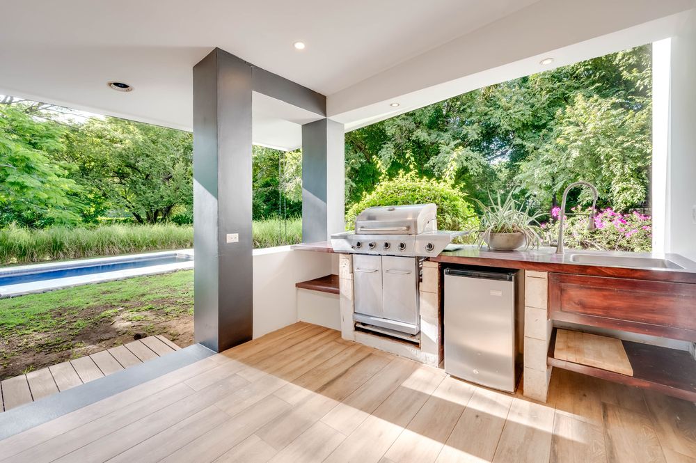 Outdoor kitchen with built-in grill