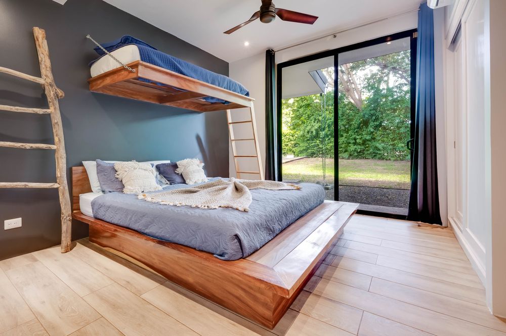 King bed with a loft bunk above